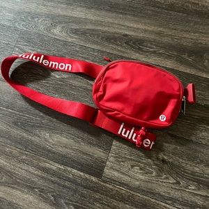 Red lululemon belt bag